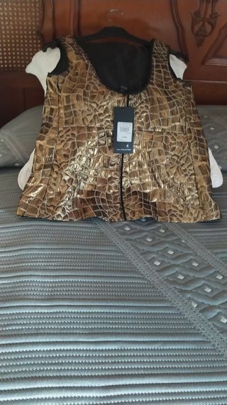 Venta en persona de Top T/M