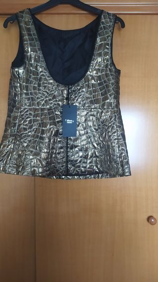 Venta en persona de Top T/M