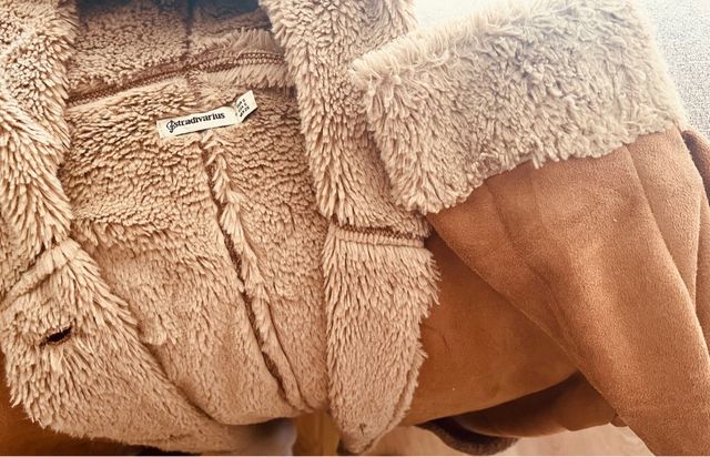 Imitation fur lined suede coat.