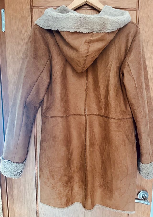 Imitation fur lined suede coat.