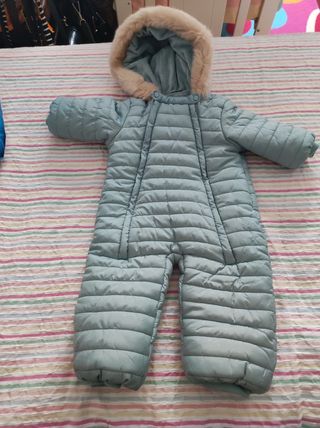 Buzo de bebe con ribete de pelo en capuc