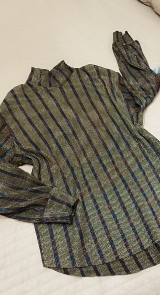 Blusa dorada manga larga