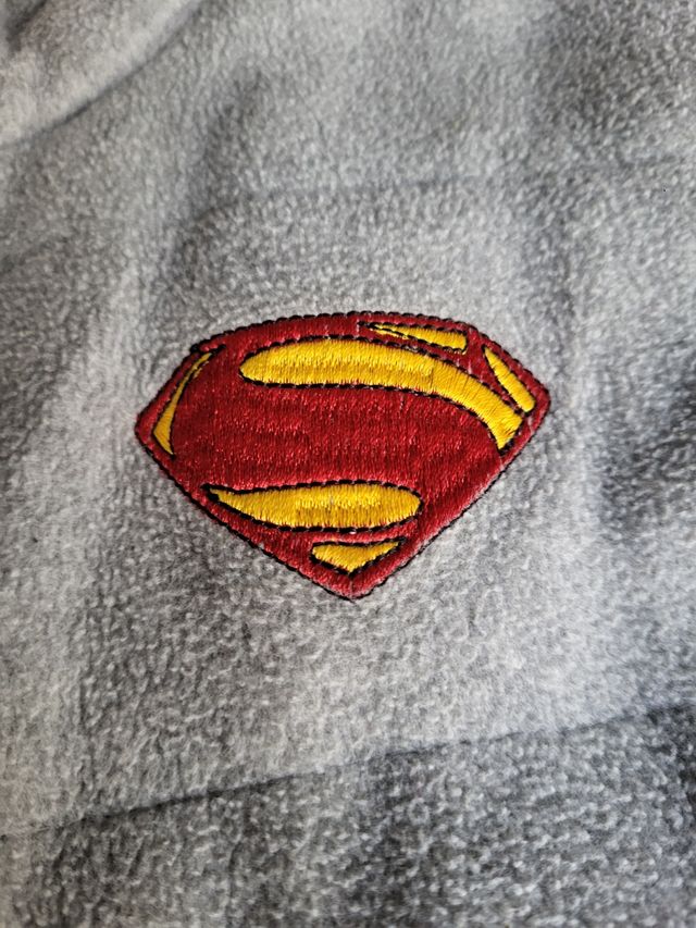 Chaleco Superman gris y reversible