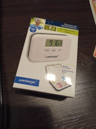 Contenedor de medicamentos con alarma