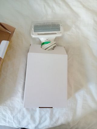 Secador de pelo con cepillo para mascota