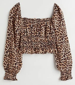 Blusa de leopardo con mangas abombadas