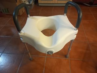 Asiento elevador para inodoro