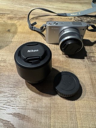NIKON J1 D33697 + Teleobiettivo zoom 30-110
