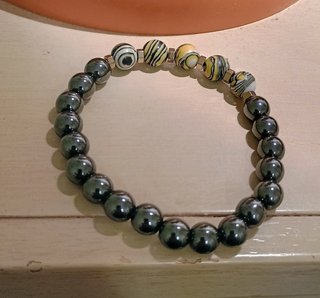 Bracciale uomo con pietre e acciaio