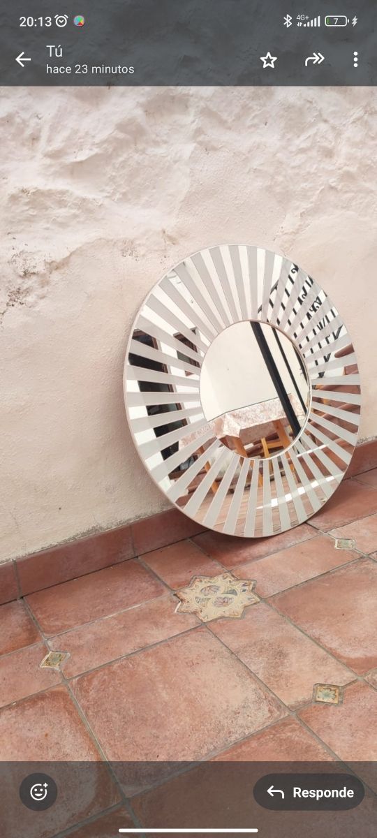 Espejo circular decorativo