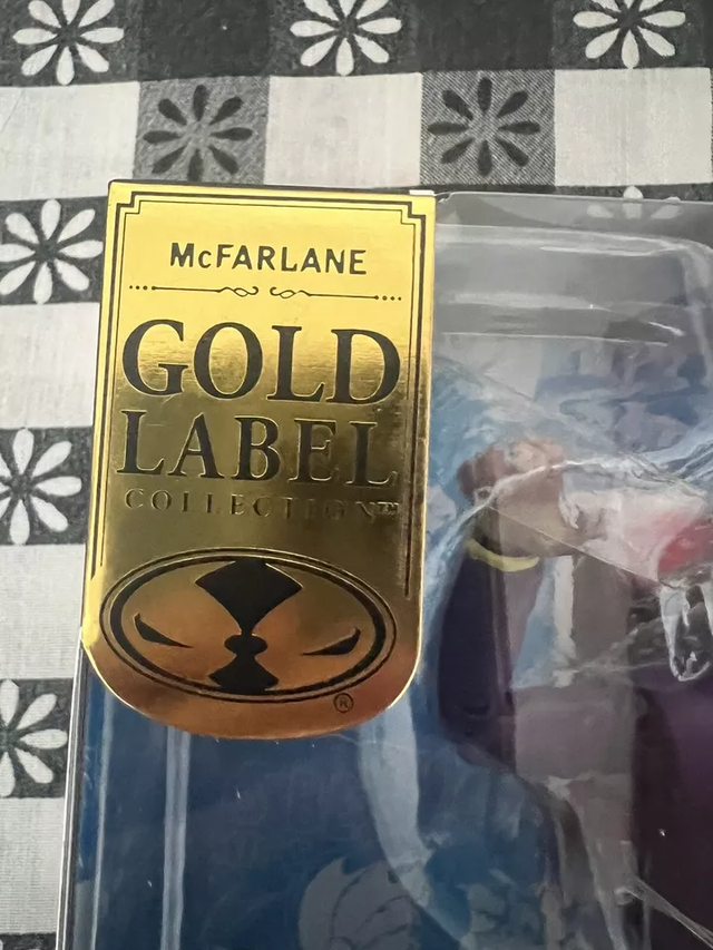 Figura de acción The Joker (Gold Label)