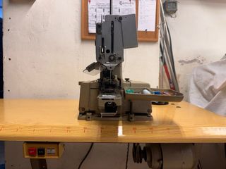 Máquina de coser botones brother