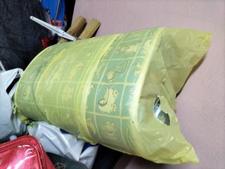 Colchón de cuna con su funda