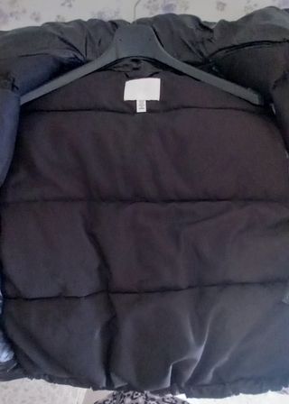 Piumino smanicato modello over