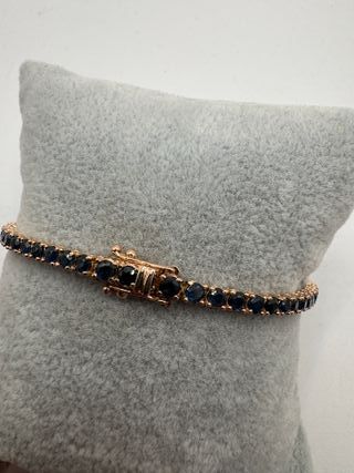 Pulsera riviere de oro rosa de 18 kt con zafiros