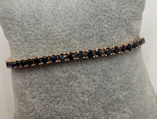 Pulsera riviere de oro rosa de 18 kt con zafiros