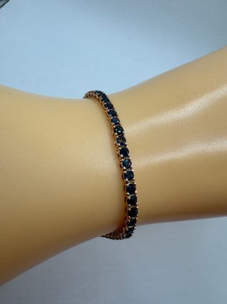 Pulsera riviere de oro rosa de 18 kt con zafiros