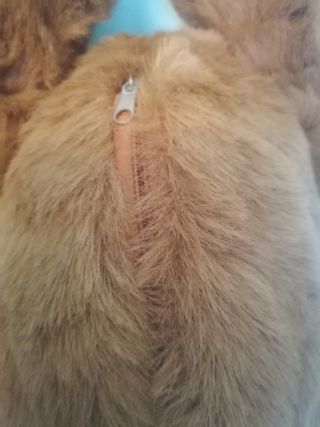 Peluche scimmia con altalena