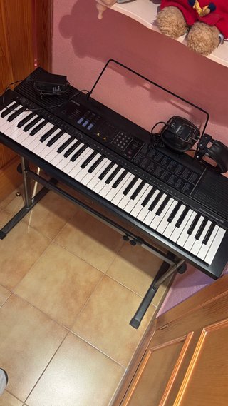 Teclado casio con auriculares
