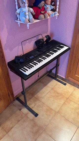 Teclado casio con auriculares