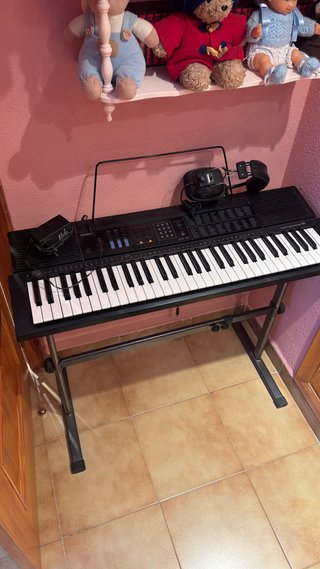 Teclado casio con auriculares