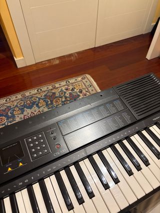 Teclado casio con auriculares