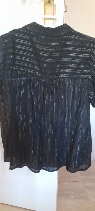 Blusa con hilos metalizados 