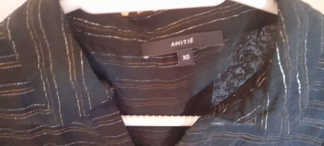 Blusa con hilos metalizados