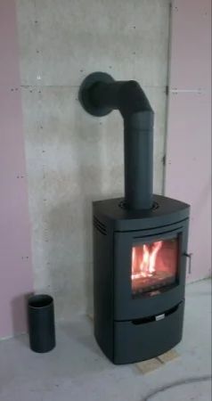Montaje de estufas de leña y cassette en chimenea.