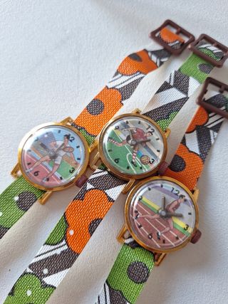 11 relojitos juguete blister vintage