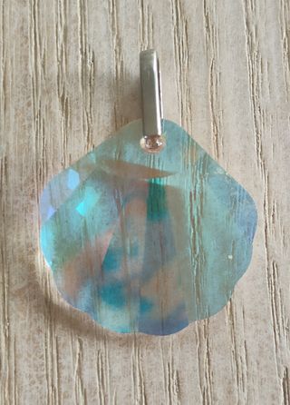 Ciondolo a forma di conchiglia