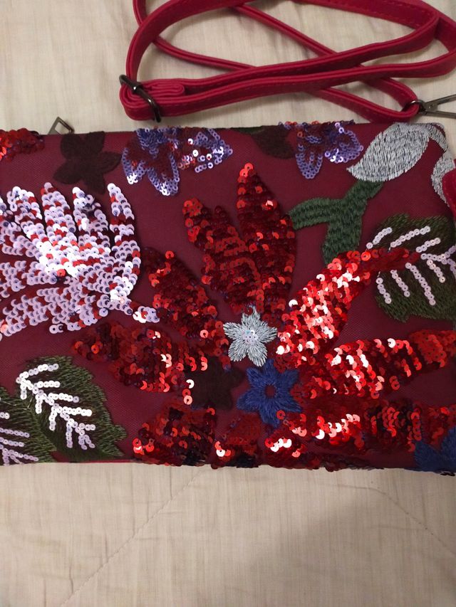 Pochette da polso e con tracolla