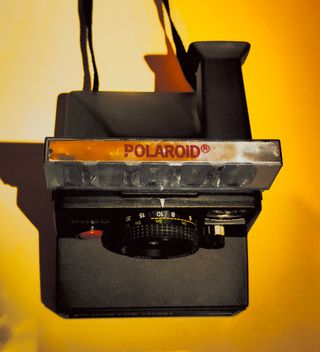 Polaroid Land 2000 + manual + bolsa + foto + flash