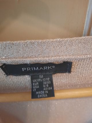 Chaqueta torera de punto brillante talla M