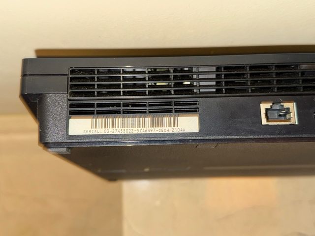 Playstation 3 + Mando + 2 juegos. Multiman instala