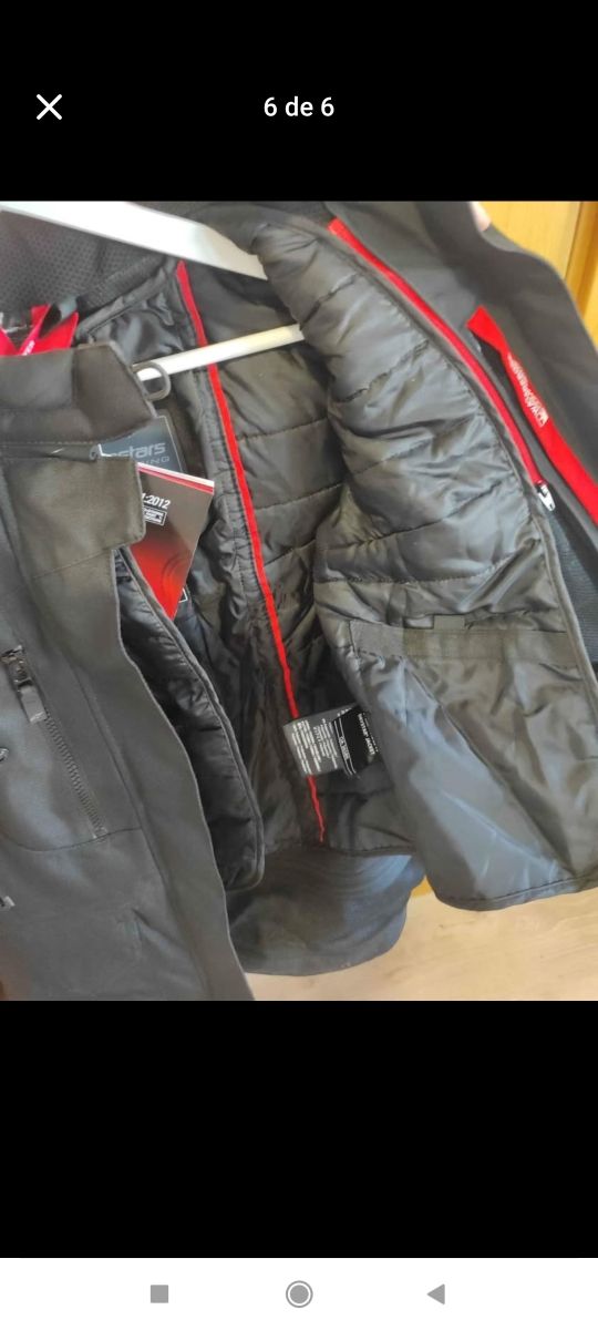 Chaqueta S y pantalón S de moto con etiquetas