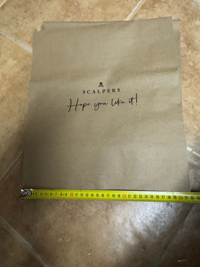 5 Sobres  de regalo y 9 bolsas de Scalpers