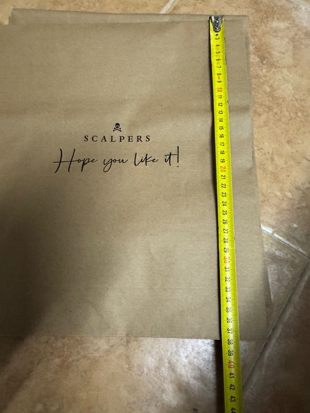 5 Sobres  de regalo y 9 bolsas de Scalpers