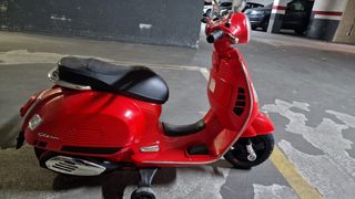 Moto vespa niño