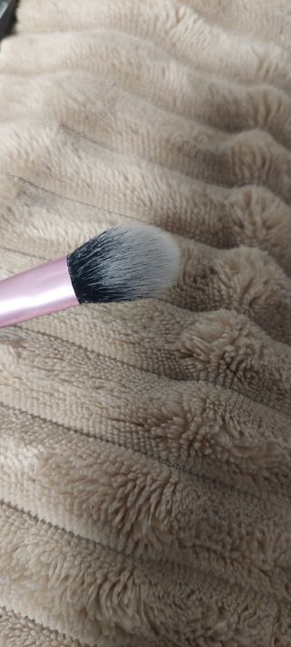 Polvos de maquillaje correctores con brocha