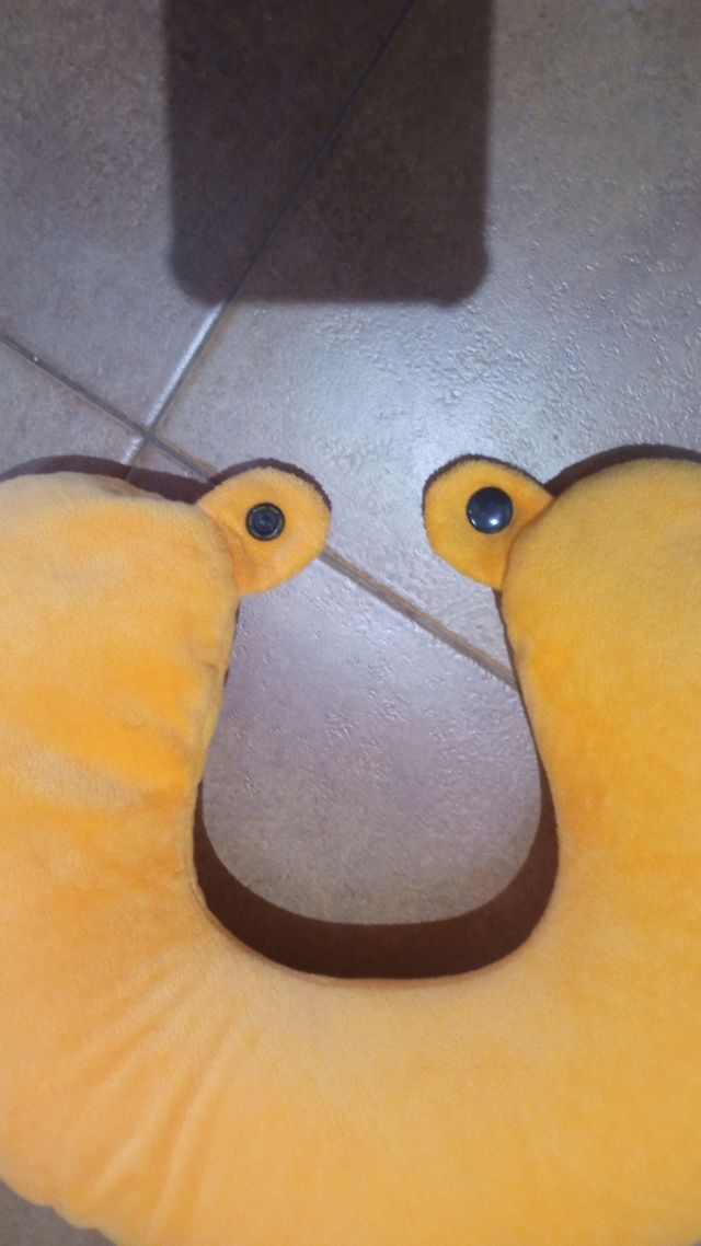 Peluche reposa cabezas