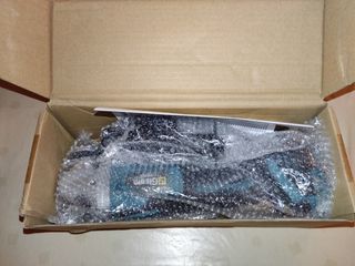 Amoladora + 2 baterías + cargador + caja regalo