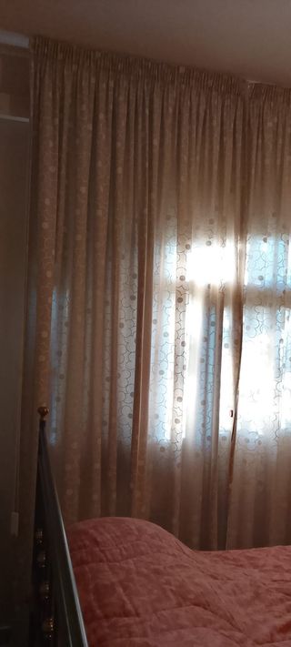 Tende oscuranti con binario a corda