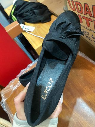 Mocasines negros ante con tacon