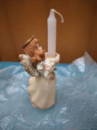 Angelo con candela Natale