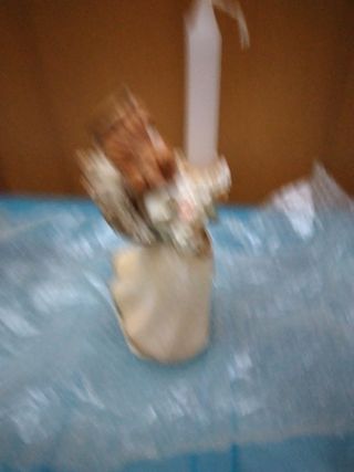 Angelo con candela Natale