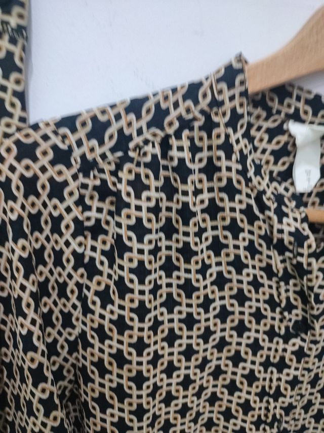 Conjunto blusa y pantalón con dibujo