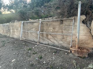 Puerta metalica finca