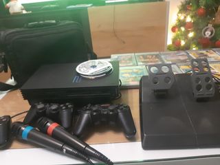 Lote de consola play 2 ,mandos,micro ...