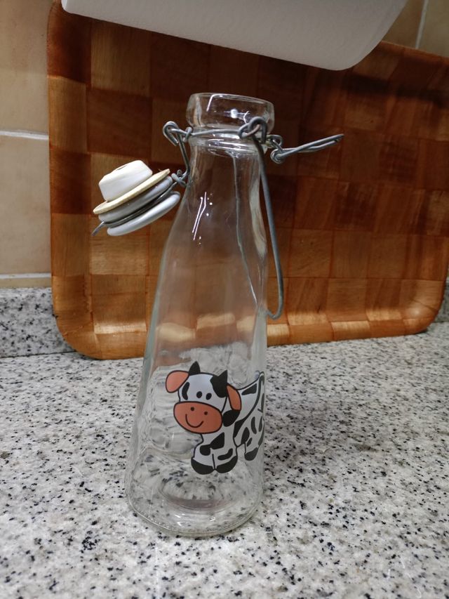 Botella de cristal vaca